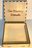 view of an open wood gift box, showing the top of the lid and the inside of the box itself.