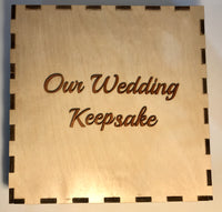 top view of wood gift box with the inscription "Our Wedding Keepsake"